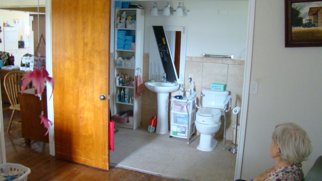 The existing small bathroom is now wheelchair friendly and very accessible